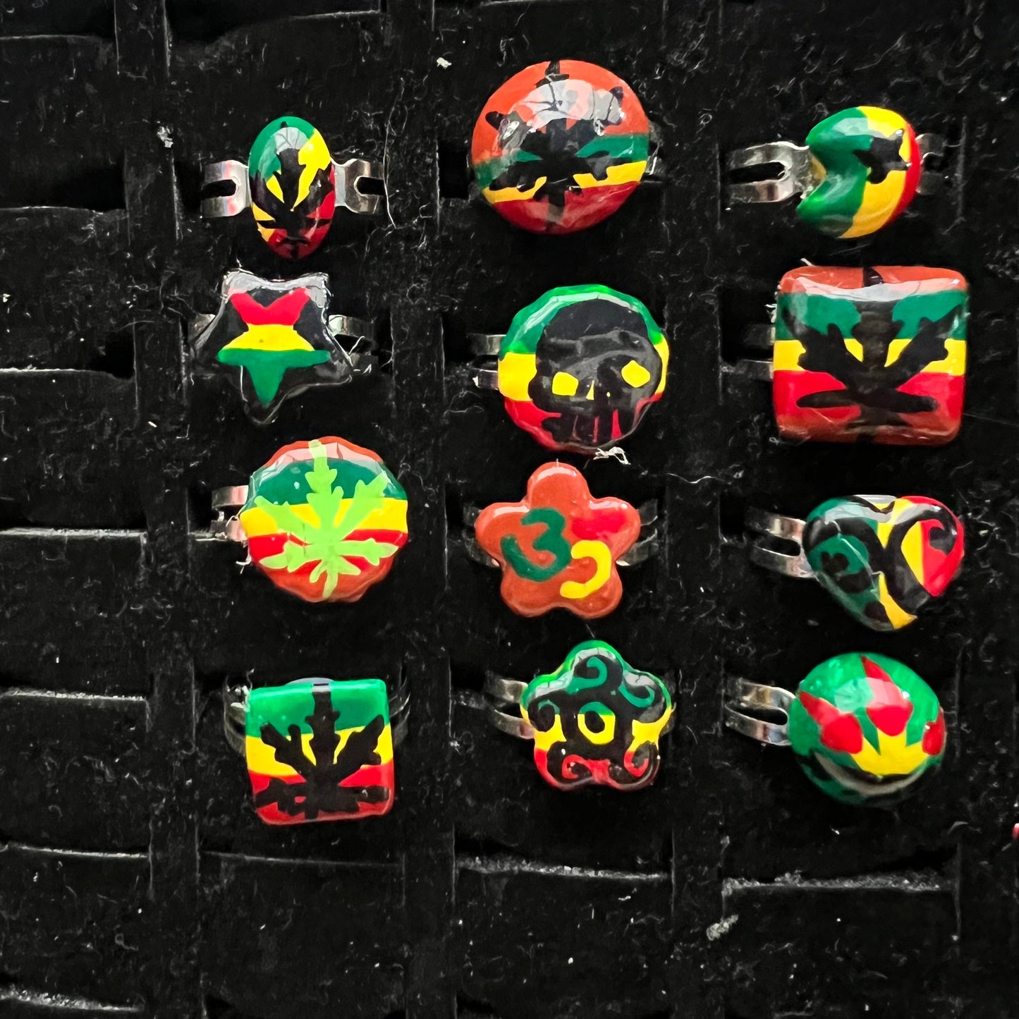 Pack of 12 pieces of Rings heart Star flower leaf weed skull Rasta painted Rings resizeable