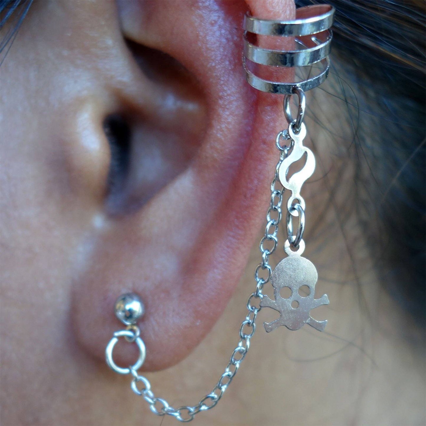 Pair of Silver Skull and Crossbones Earrings Wrap Cuff Clip Chain Pirate Studs